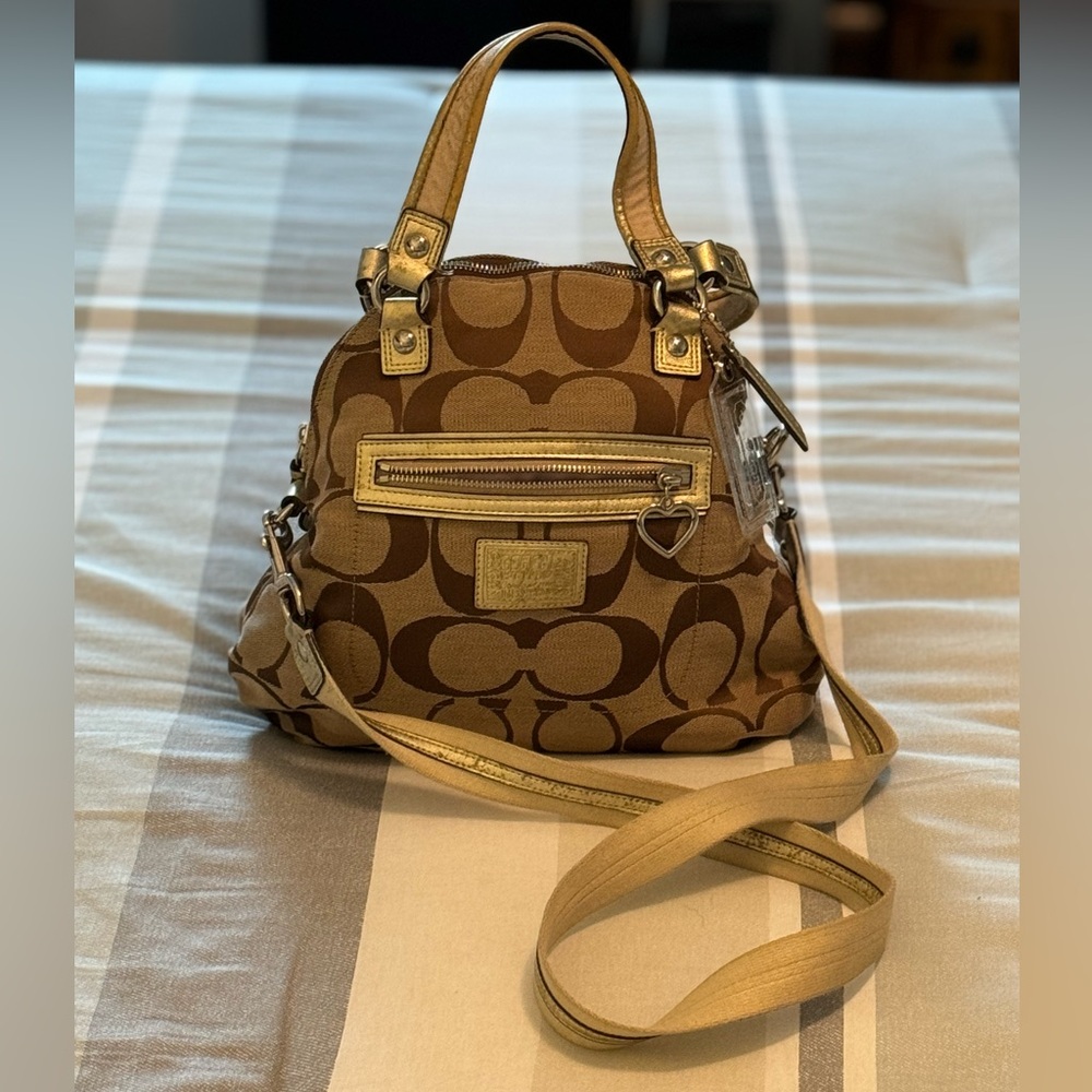 Coach purse with strap.
